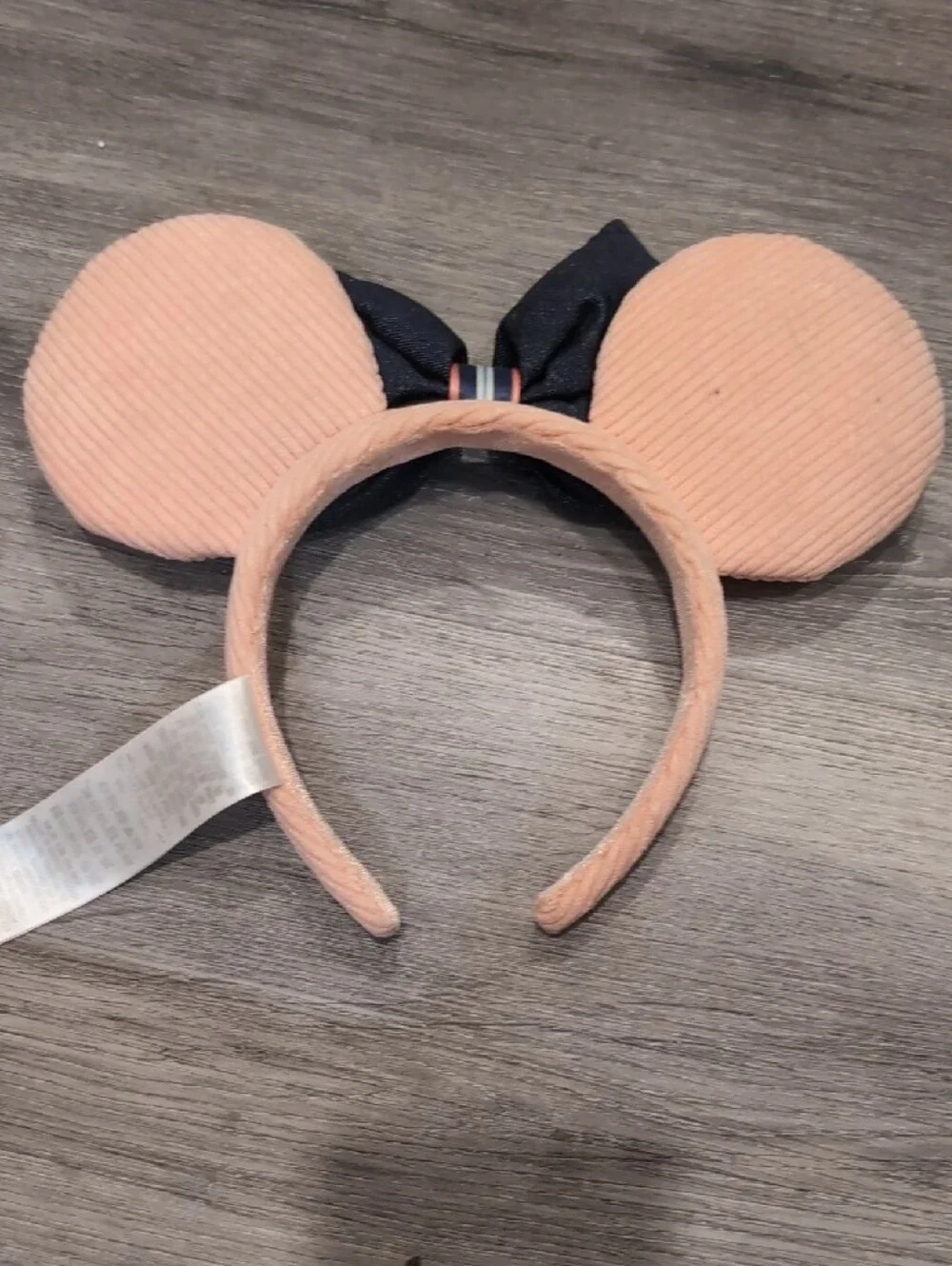 Disney Peach Minnie Ear Headband with Black Bow Accent